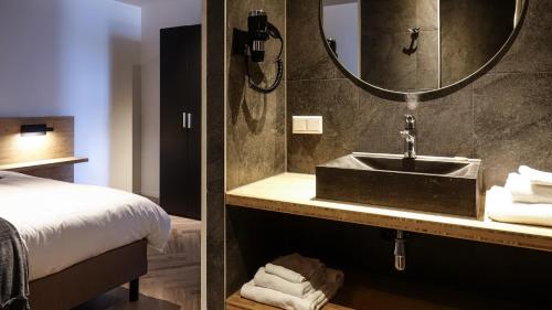 Et badeværelse på Dock Hotel Stellendam