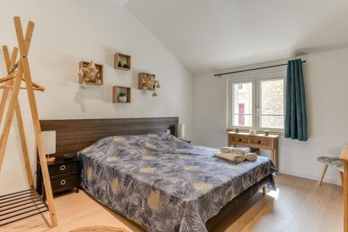 Krevet ili kreveti u jedinici u okviru objekta Spacieuse villa proche de la mer