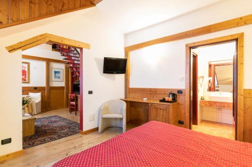 Postel nebo postele na pokoji v ubytování G. Hotel Des Alpes (Classic since 1912)