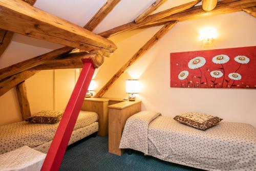 Postel nebo postele na pokoji v ubytování G. Hotel Des Alpes (Classic since 1912)