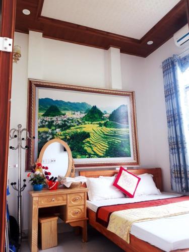 Postel nebo postele na pokoji v ubytování Yen Minh Hotel Thien An