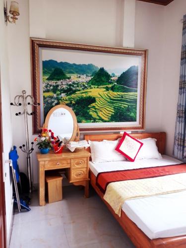 Postel nebo postele na pokoji v ubytování Yen Minh Hotel Thien An