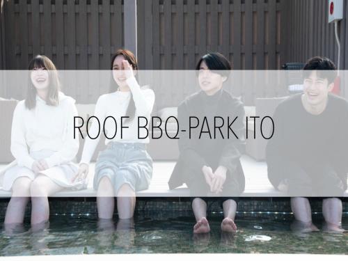 a group of people sitting on a bench at Smart Stay Ito 302 in Ito