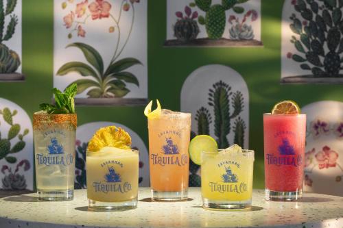 a group of different colored drinks on a table at JW Marriott Savannah Plant Riverside District in Savannah