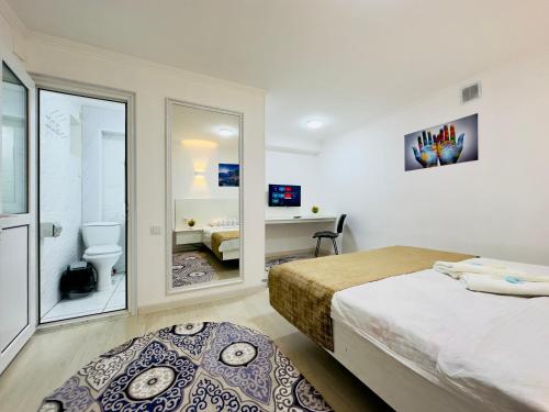 Postel nebo postele na pokoji v ubytování ABS Guest House Osh
