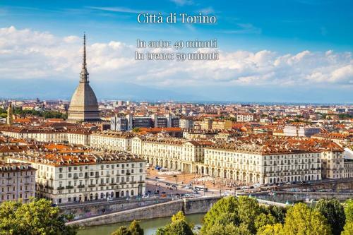 a view of the city of lyon with a tower at Casa Fiori [Centro città, Free parking] in Bra
