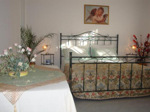 Postel nebo postele na pokoji v ubytování B&B Villa Sitrie