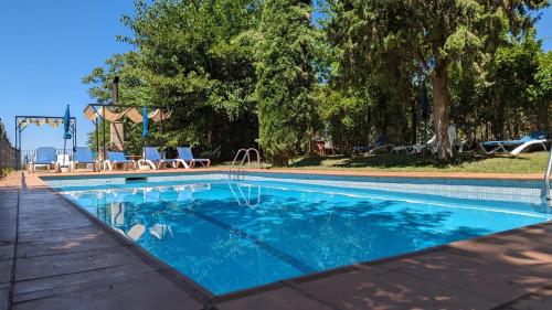 Swimmingpoolen hos eller tæt på Casas Rurales Los Cortijos
