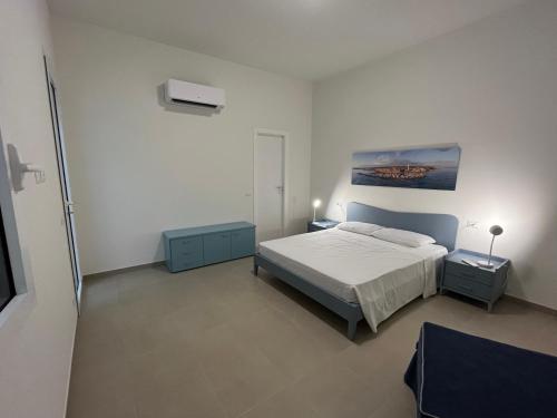 Postel nebo postele na pokoji v ubytování IL GIARDINO DAMARE 2