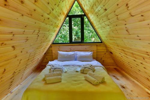 Ένα ή περισσότερα κρεβάτια σε δωμάτιο στο Discover Gulebi
