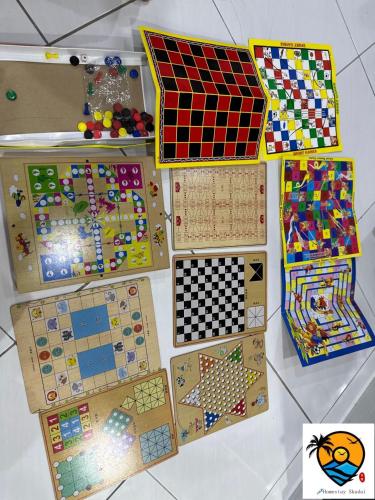 a pile of lego items on a table at ZZZ HOMESTAY SKUDAI in Skudai
