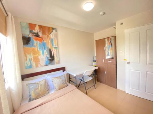 Ένα ή περισσότερα κρεβάτια σε δωμάτιο στο Aimee Exquisite Spaces
