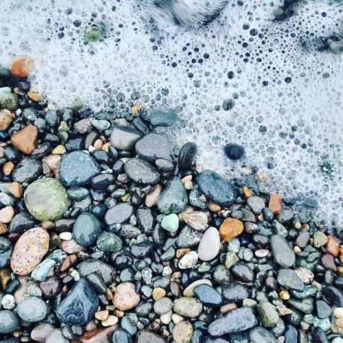 a group of rocks on a beach with water at Weekender - guest house in K'obulet'i