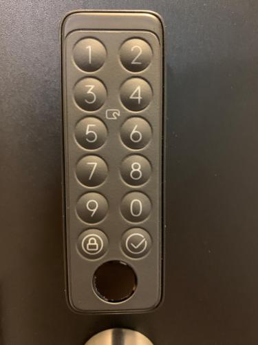 a close up of a remote control on an elevator at O2 capsule house OTARU in Otaru
