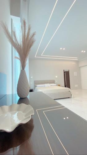 Katil atau katil-katil dalam bilik di Meligrana Central Rooms