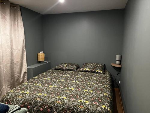 Ένα ή περισσότερα κρεβάτια σε δωμάτιο στο Superbe Appartement Centre B
