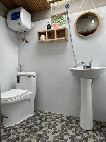 Ванная комната в Kiên Mán Homestay