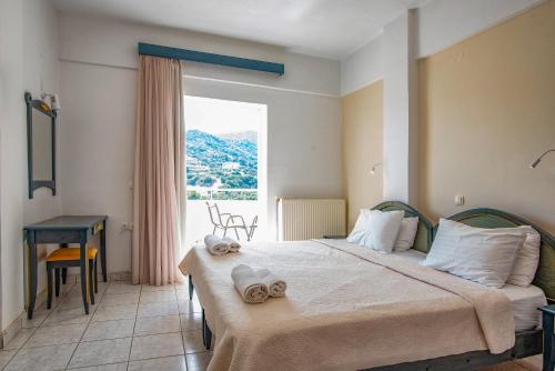 Posteľ alebo postele v izbe v ubytovaní Antonis Apts, Physio Fitness Retreats