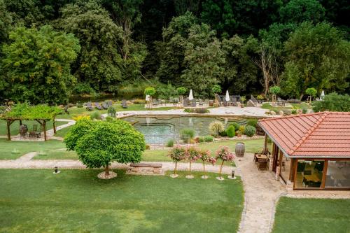 an aerial view of a garden with a pool at Penzion Včelařský Dvůr in Lednice