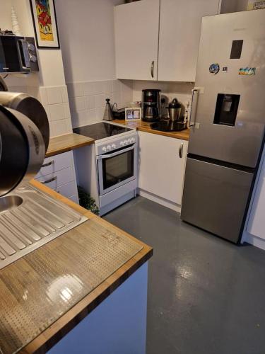 Kuchyň nebo kuchyňský kout v ubytování Apartment Near Norwich City