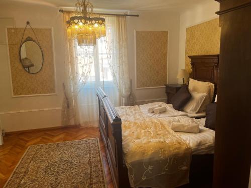 a bedroom with a large bed and a window at Apartment Hisa 7 Piran in Piran