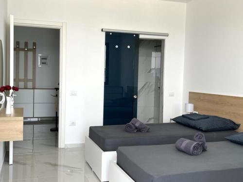 Postel nebo postele na pokoji v ubytování DIAMOND STAR 2