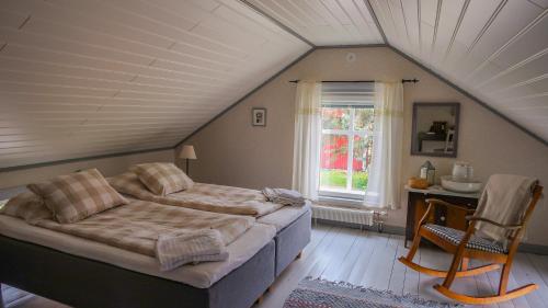 Llit o llits en una habitació de Lillstugan