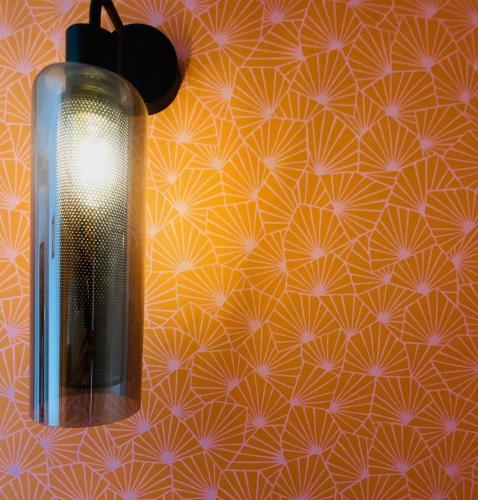 a close up of a light on a wall at Vintner Suites in Neustadt an der Weinstraße