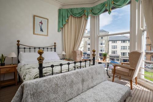 Postel nebo postele na pokoji v ubytování Serenity Guest House