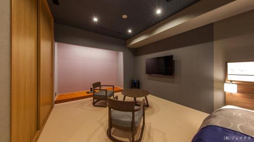Televisyen dan/atau pusat hiburan di REX HOTEL Beppu