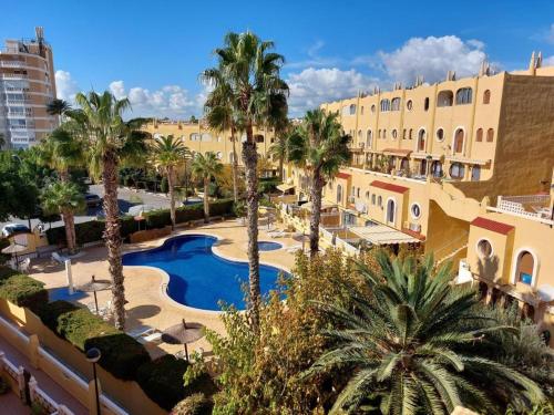 Πισίνα στο ή κοντά στο Bungalow Alkabir Playa