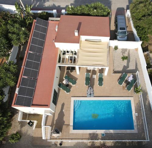 an overhead view of a house with a swimming pool at Villa Jordi - Cala en Porter in Cala'n Porter