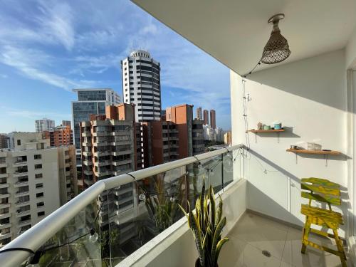 a balcony with a view of a city at Matilda apt - Feel at home in Barranquilla in Barranquilla