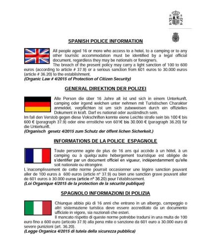 a document with the flag of the british police interpol at Casa de Las Flores - Apartamento con jardín privado frente a la Playa de Comillas in Comillas