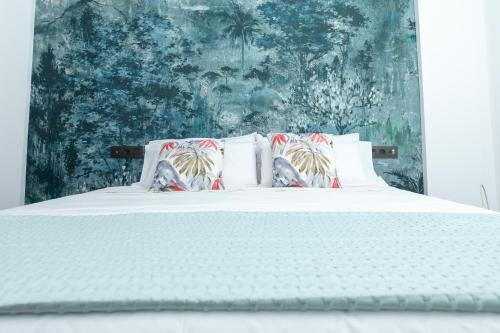 Postel nebo postele na pokoji v ubytování Canteras Beach Crush