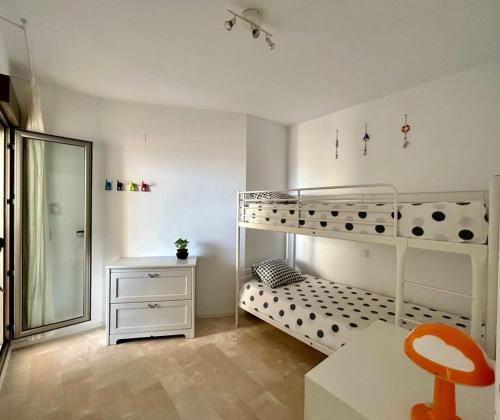 A bed or beds in a room at Carboneras - Holidays Time
