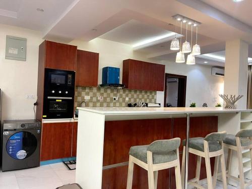 Kuchyň nebo kuchyňský kout v ubytování Staycation Loft, Lekki Phase 1