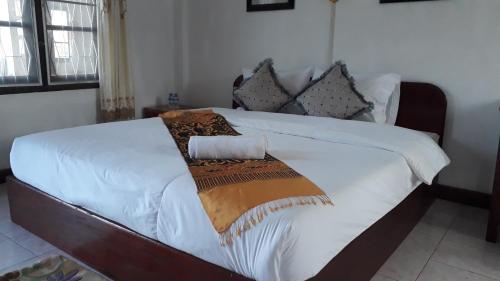 Postel nebo postele na pokoji v ubytování Sanhak Guesthouse 1