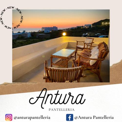 a picture of a balcony with a table and chairs at Antura in Pantelleria