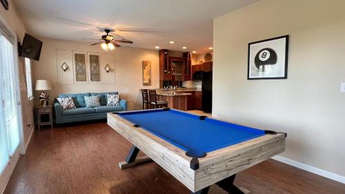 a living room with a pool table in it at Mistletoe Cabin- Private cabin w views, Hottub, pet friendly in Murphy