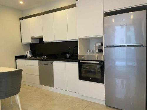Кухня или мини-кухня в Lovely 2+1 apartment, a few meters from the beach

