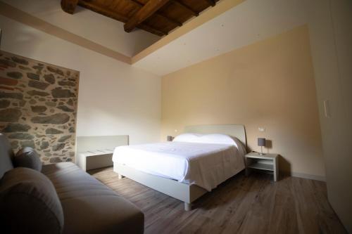 Säng eller sängar i ett rum på Casa vacanze Raggio di Sole