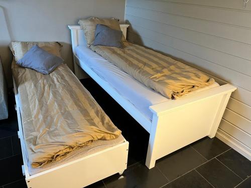 Ένα ή περισσότερα κρεβάτια σε δωμάτιο στο Cosy and well-equipped apartment with free parking