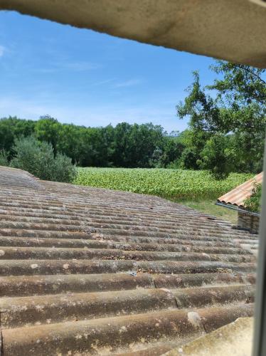 a set of stone stairs with a field in the background at Saint Laurent in Portes-en-Valdaine