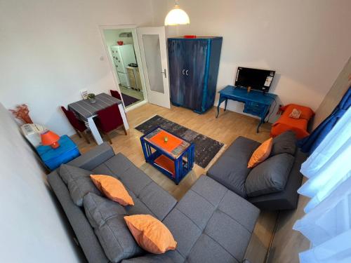 an overhead view of a living room with a couch and a television at Ana in Paraćin