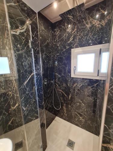 Koupelna v ubytování EPONIMI ROOMs