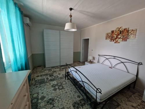 Ένα ή περισσότερα κρεβάτια σε δωμάτιο στο GRANAI COUNTRY HOME