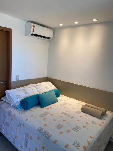Postel nebo postele na pokoji v ubytování Flat alto padrão em Tamandaré