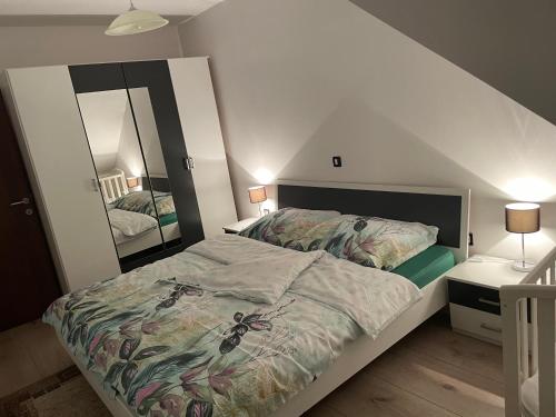 Posteľ alebo postele v izbe v ubytovaní Apartmani G&E