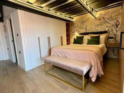 Ένα ή περισσότερα κρεβάτια σε δωμάτιο στο Apartamentos Magdalena